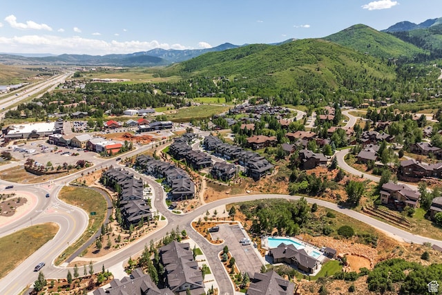 3302 Quarry Springs Dr, Park City, UT 84098 - aerial overview of property's location with a mountain backdrop and nearby suburban area