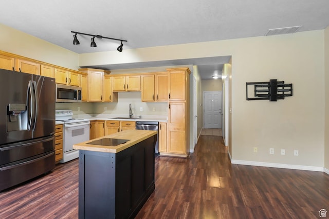 3901 W Pine Landing Way S, West Jordan, UT 84084 - kitchen featuring stainless steel appliances, light brown cabinets, light countertops, dark wood-type flooring, and a center island