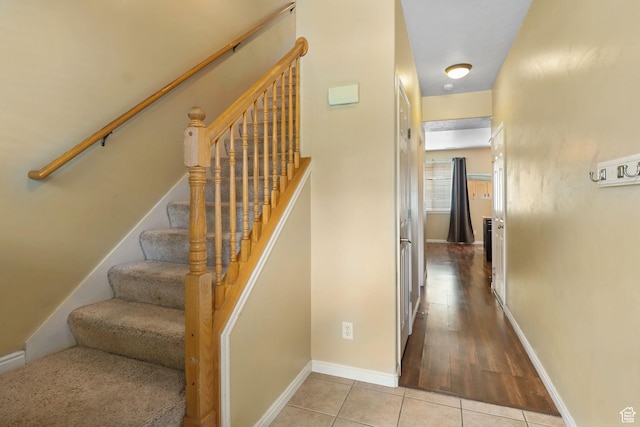 3901 W Pine Landing Way S, West Jordan, UT 84084 - stairway featuring tile patterned flooring and baseboards