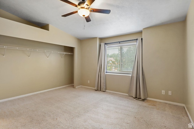 3901 W Pine Landing Way S, West Jordan, UT 84084 - unfurnished bedroom featuring carpet floors, a closet, vaulted ceiling, and ceiling fan
