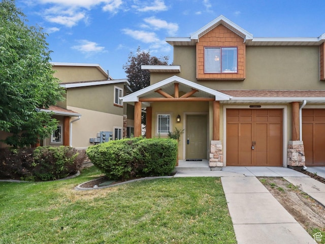 3901 W Pine Landing Way S, West Jordan, UT 84084 - view of front of property with driveway, a front yard, an attached garage, and stucco siding