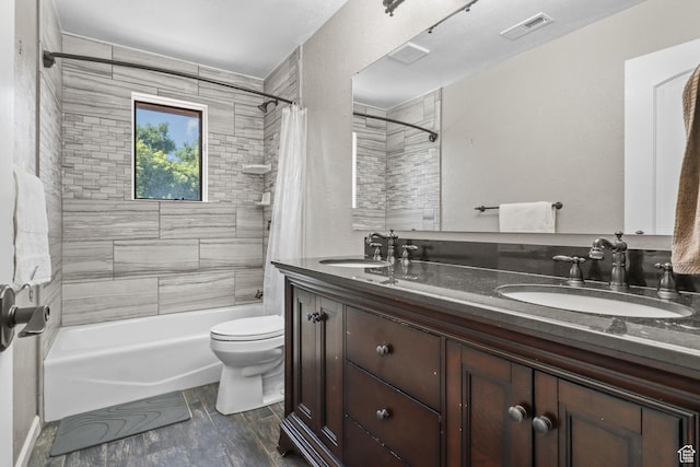 9618 S Ruskin Cir E, Sandy, UT 84092 - full bath with shower / bath combination with curtain, double vanity, and wood finished floors