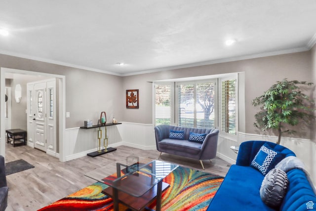 9618 S Ruskin Cir E, Sandy, UT 84092 - living area featuring a wainscoted wall, wood finished floors, ornamental molding, and recessed lighting