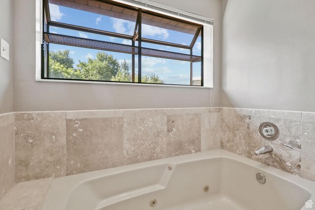 9618 S Ruskin Cir E, Sandy, UT 84092 - full bath featuring healthy amount of natural light and a tub with jets