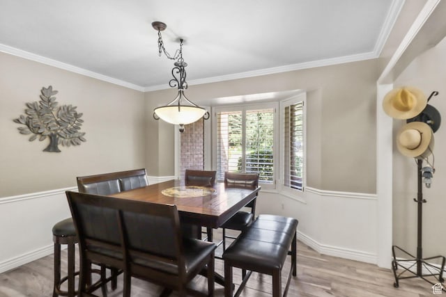 9618 S Ruskin Cir E, Sandy, UT 84092 - dining area featuring wood finished floors and ornamental molding