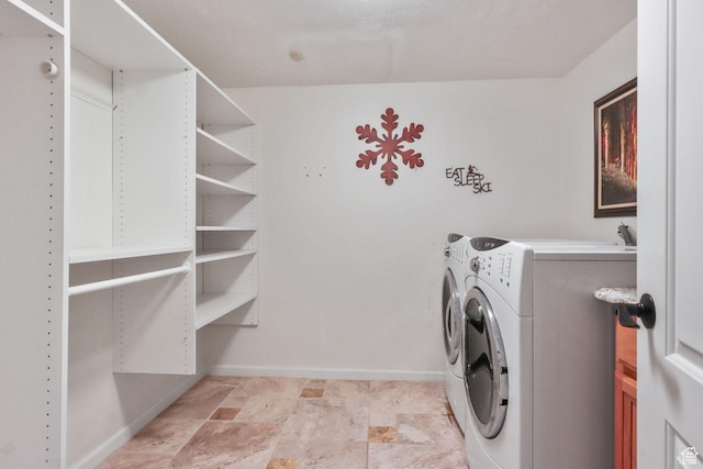9618 S Ruskin Cir E, Sandy, UT 84092 - laundry area with washing machine and dryer and baseboards