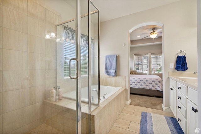 598 W Sandhill Dr, Lehi, UT 84043 - ensuite bathroom featuring a stall shower, vanity, a garden tub, ceiling fan, and recessed lighting