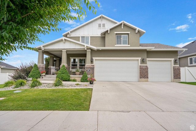 598 W Sandhill Dr, Lehi, UT 84043 - craftsman inspired home with covered porch, concrete driveway, stucco siding, brick siding, and board and batten siding