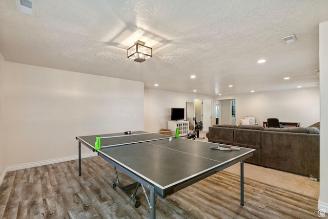 598 W Sandhill Dr, Lehi, UT 84043 - game room featuring a textured ceiling, wood finished floors, and recessed lighting