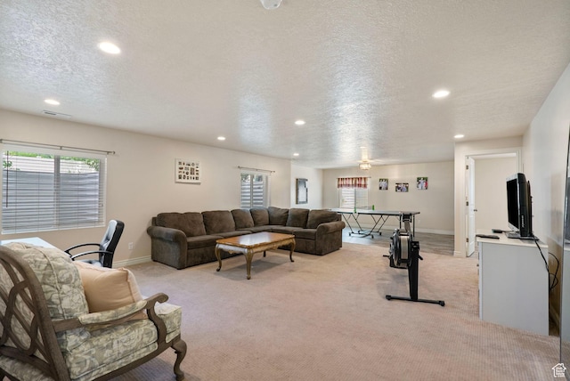 598 W Sandhill Dr, Lehi, UT 84043 - living area featuring recessed lighting, light colored carpet, plenty of natural light, and a textured ceiling