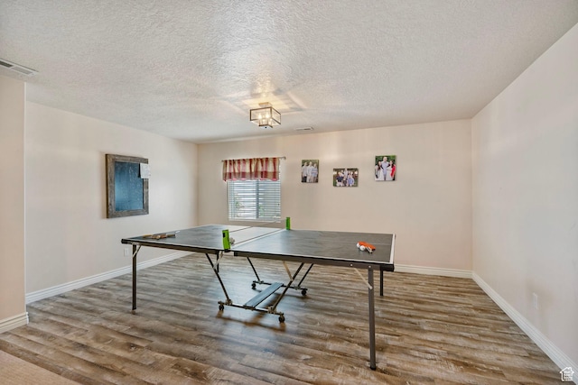 598 W Sandhill Dr, Lehi, UT 84043 - rec room with wood finished floors and a textured ceiling