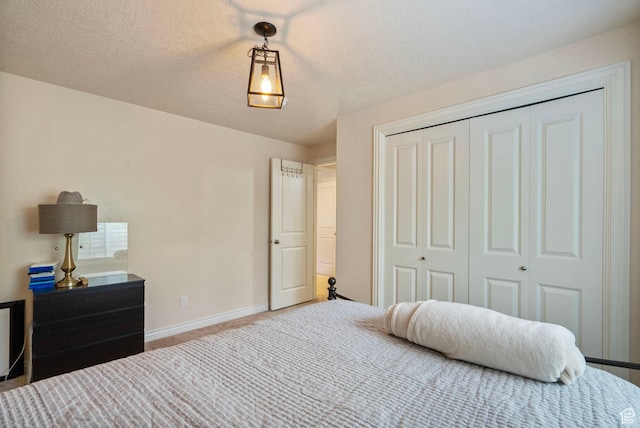 598 W Sandhill Dr, Lehi, UT 84043 - carpeted bedroom featuring a closet and a textured ceiling