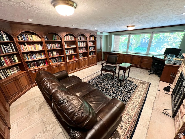 3550 E Oakview Dr, Millcreek, UT 84124 - office area with a textured ceiling, built in shelves, and bookshelves