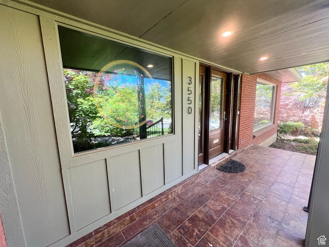 3550 E Oakview Dr, Millcreek, UT 84124 - entrance to property featuring board and batten siding and covered porch