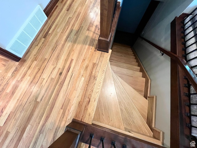 3550 E Oakview Dr, Millcreek, UT 84124 - staircase with wood finished floors