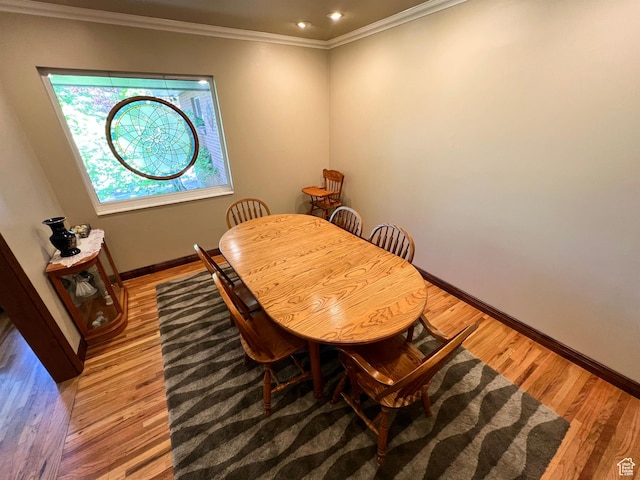 3550 E Oakview Dr, Millcreek, UT 84124 - dining space with light wood-type flooring and ornamental molding