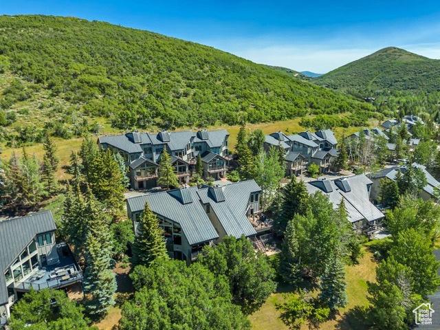 1290 Pinnacle Dr, Park City, UT 84060 - drone / aerial view of a forest and a mountainous background