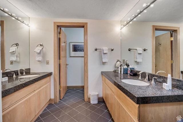 1290 Pinnacle Dr, Park City, UT 84060 - full bathroom featuring tile patterned flooring and two vanities