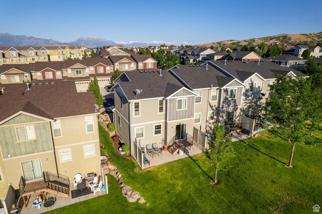 14584 S Heatherly Ln, Herriman, UT 84096 - aerial view of residential area featuring a mountain backdrop