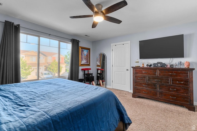 14584 S Heatherly Ln, Herriman, UT 84096 - bedroom with light colored carpet and ceiling fan