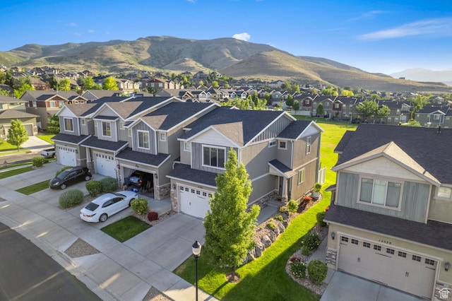 14584 S Heatherly Ln, Herriman, UT 84096 - aerial perspective of suburban area with a mountainous background
