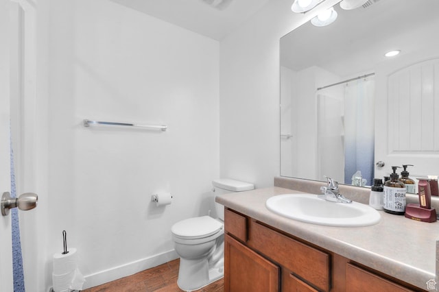 14584 S Heatherly Ln, Herriman, UT 84096 - full bathroom with vanity, wood finished floors, and a shower with shower curtain