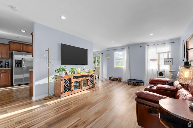 14584 S Heatherly Ln, Herriman, UT 84096 - living area with light wood-type flooring and recessed lighting