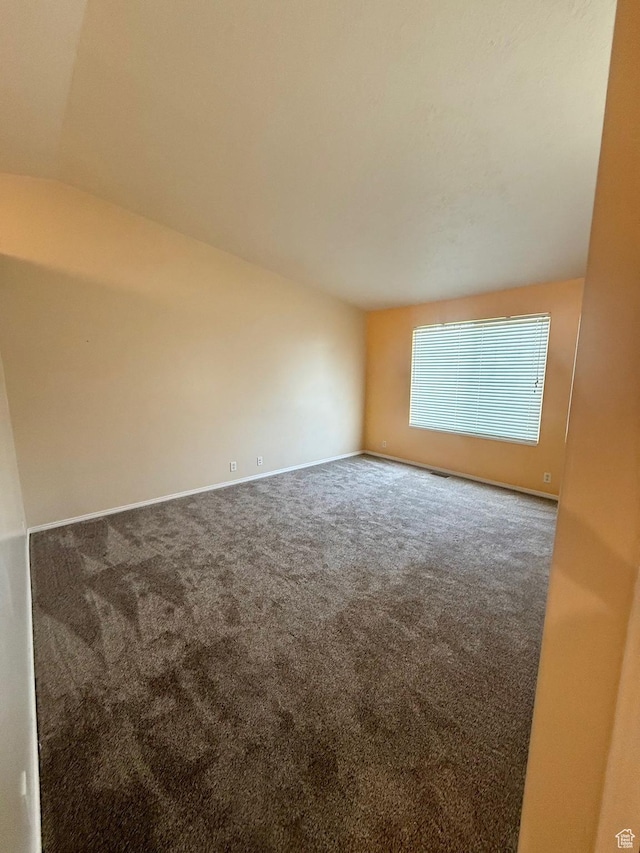 428 E 810 N, Tooele, UT 84074 - spare room featuring carpet and lofted ceiling
