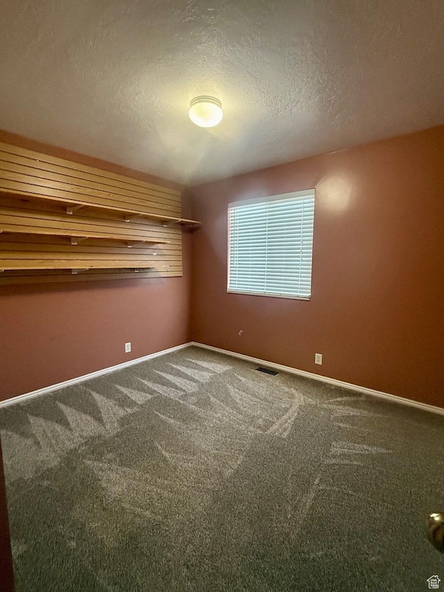 428 E 810 N, Tooele, UT 84074 - unfurnished bedroom with carpet and a textured ceiling