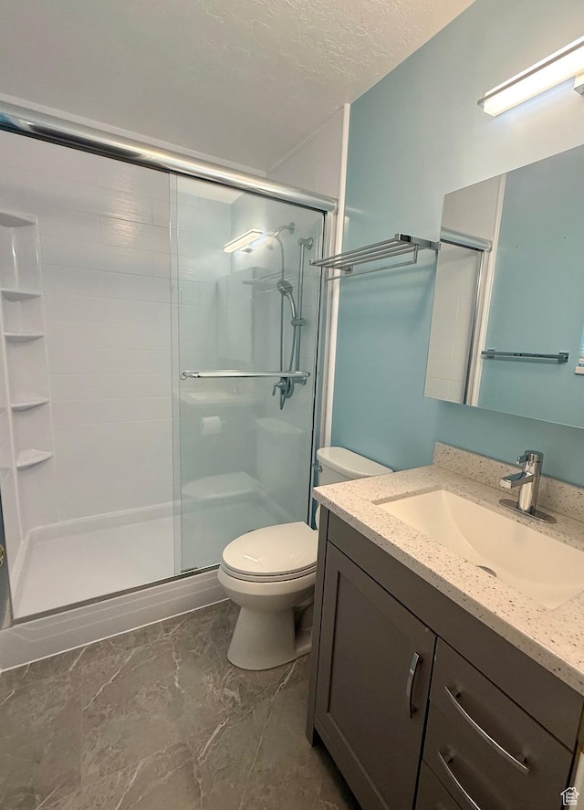 428 E 810 N, Tooele, UT 84074 - full bathroom featuring vanity, a stall shower, and marble look tiles