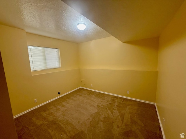 428 E 810 N, Tooele, UT 84074 - spare room featuring a textured ceiling and carpet