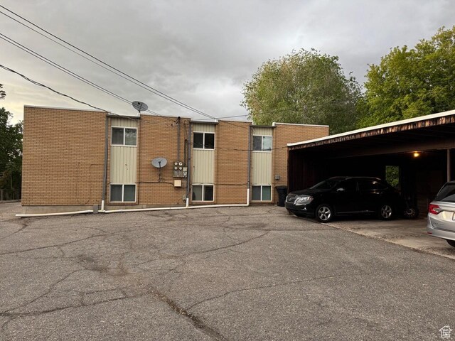 266 E Center St, Centerville, UT 84014 - view of property featuring covered parking
