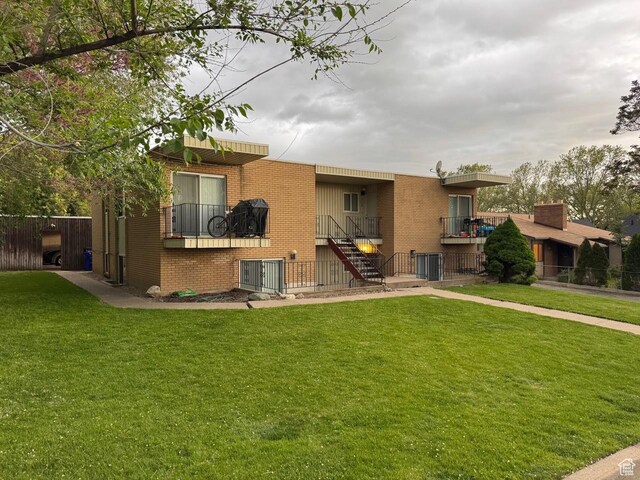 266 E Center St, Centerville, UT 84014 - rear view of property with brick siding