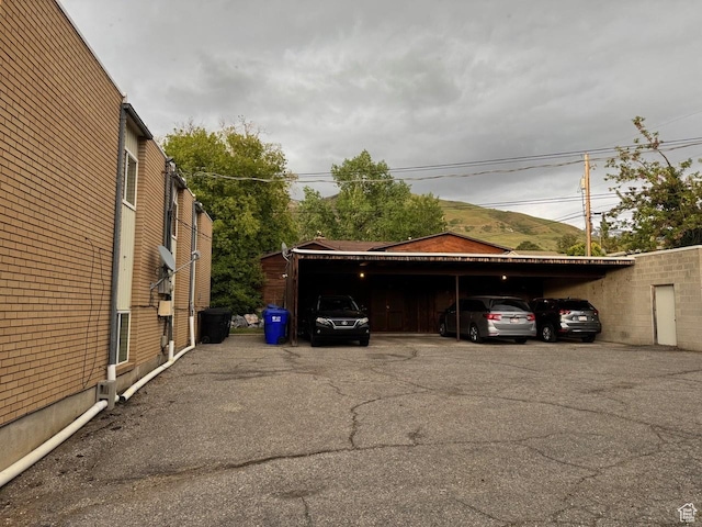 266 E Center St, Centerville, UT 84014 - view of car parking featuring a mountain view