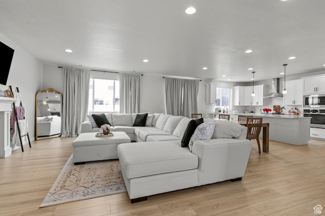 2488 W 2940 S, Syracuse, UT 84075 - living area featuring recessed lighting and light wood finished floors