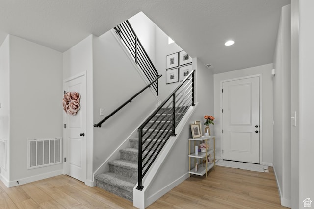 2488 W 2940 S, Syracuse, UT 84075 - entrance foyer with light wood-type flooring, stairs, and recessed lighting