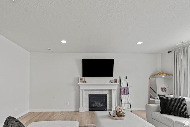 2488 W 2940 S, Syracuse, UT 84075 - living area featuring light wood-style floors, recessed lighting, and a brick fireplace