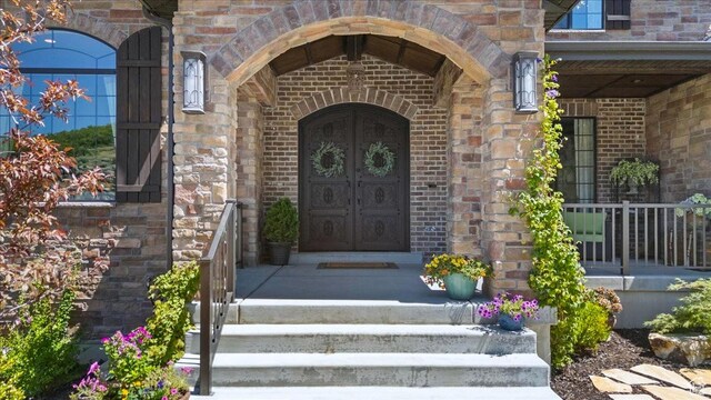 10865 S Hiddenwood Dr, Sandy, UT 84092 - property entrance featuring brick siding