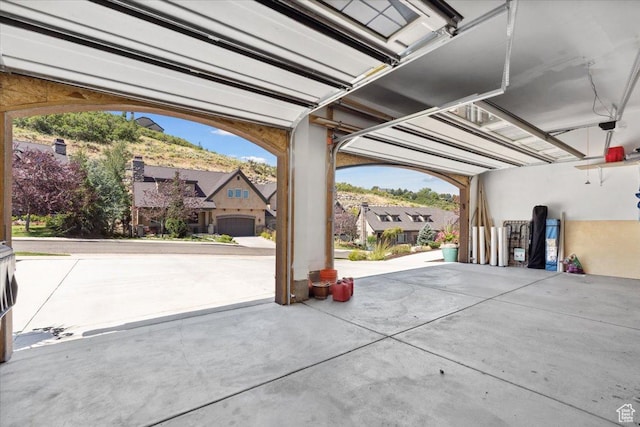 10865 S Hiddenwood Dr, Sandy, UT 84092 - garage featuring a residential view