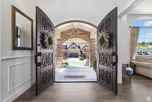 10865 S Hiddenwood Dr, Sandy, UT 84092 - entrance foyer with wood-type flooring and vaulted ceiling