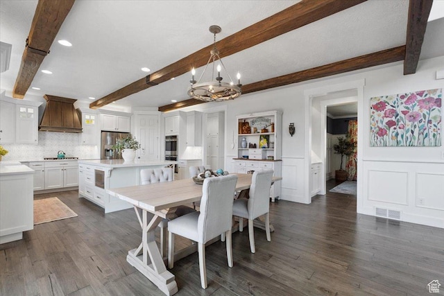10865 S Hiddenwood Dr, Sandy, UT 84092 - dining space featuring beam ceiling, a chandelier, dark wood-type flooring, and recessed lighting