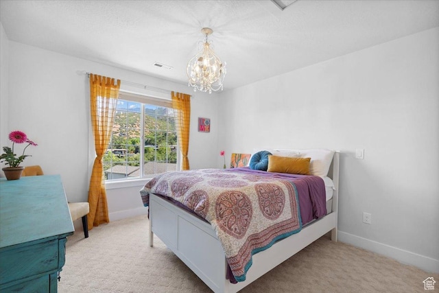 10865 S Hiddenwood Dr, Sandy, UT 84092 - bedroom featuring a chandelier and light colored carpet