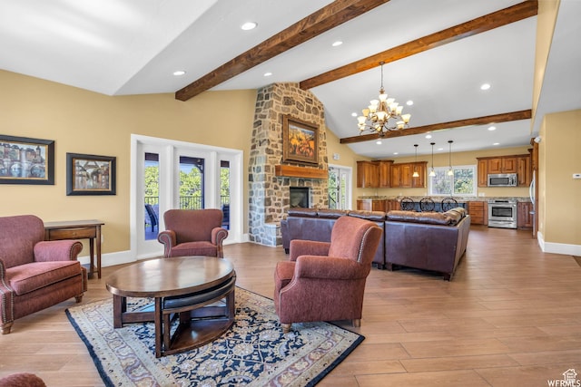 10865 S Hiddenwood Dr, Sandy, UT 84092 - living area with a fireplace, a chandelier, light wood-style flooring, beam ceiling, and recessed lighting