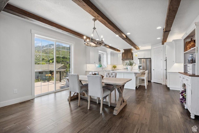 10865 S Hiddenwood Dr, Sandy, UT 84092 - dining area with beamed ceiling, dark wood finished floors, a chandelier, recessed lighting, and a textured ceiling