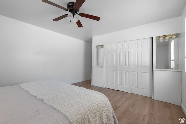 2536 S 1000 W, Syracuse, UT 84075 - bedroom featuring wood finished floors, a closet, and ceiling fan