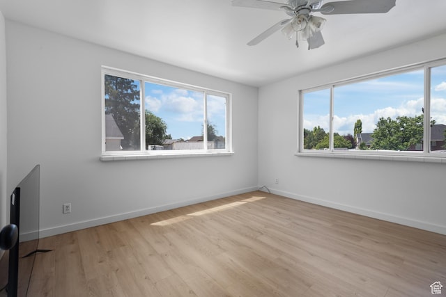 2536 S 1000 W, Syracuse, UT 84075 - empty room with wood finished floors and ceiling fan
