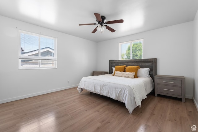 2536 S 1000 W, Syracuse, UT 84075 - bedroom featuring light wood-type flooring and a ceiling fan