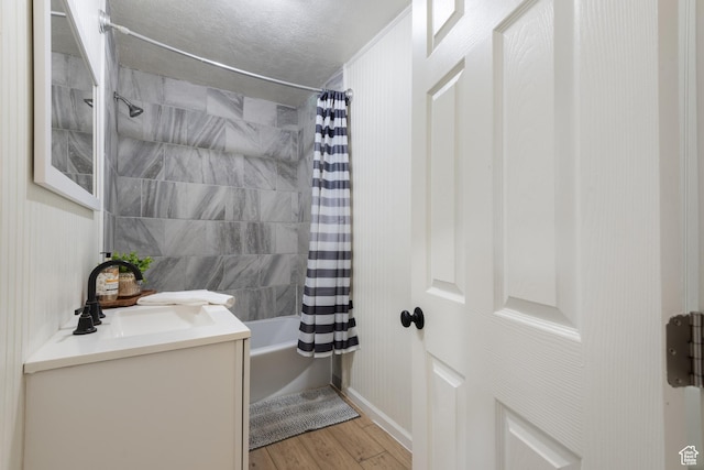 2536 S 1000 W, Syracuse, UT 84075 - full bath featuring vanity, shower / bath combo, and wood finished floors