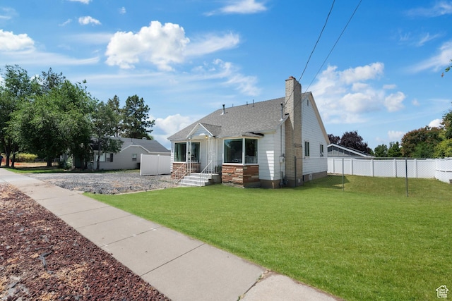 2536 S 1000 W, Syracuse, UT 84075 - view of front of house with roof with shingles and a chimney