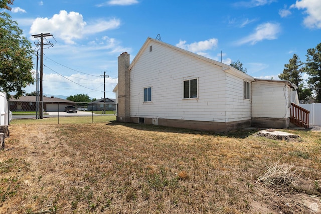 2536 S 1000 W, Syracuse, UT 84075 - view of side of home with a chimney